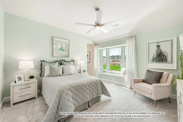 a bedroom with a bed and glass window