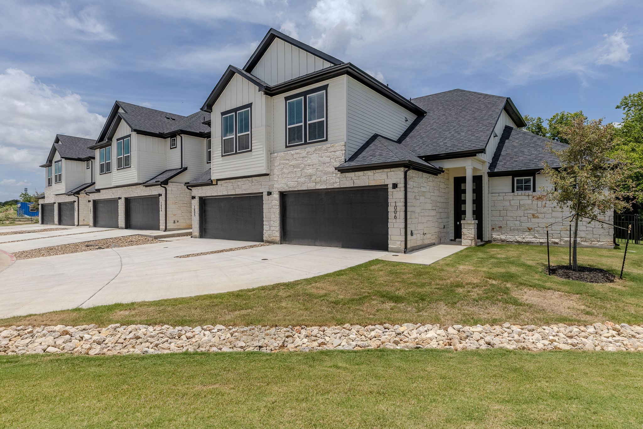2600 Gattis School Road, Unit 1002 Round Rock, TX 78664 - Photo 40 of 40 Clean lines and a striking facade define this row of contemporary residences, each with individual garages.