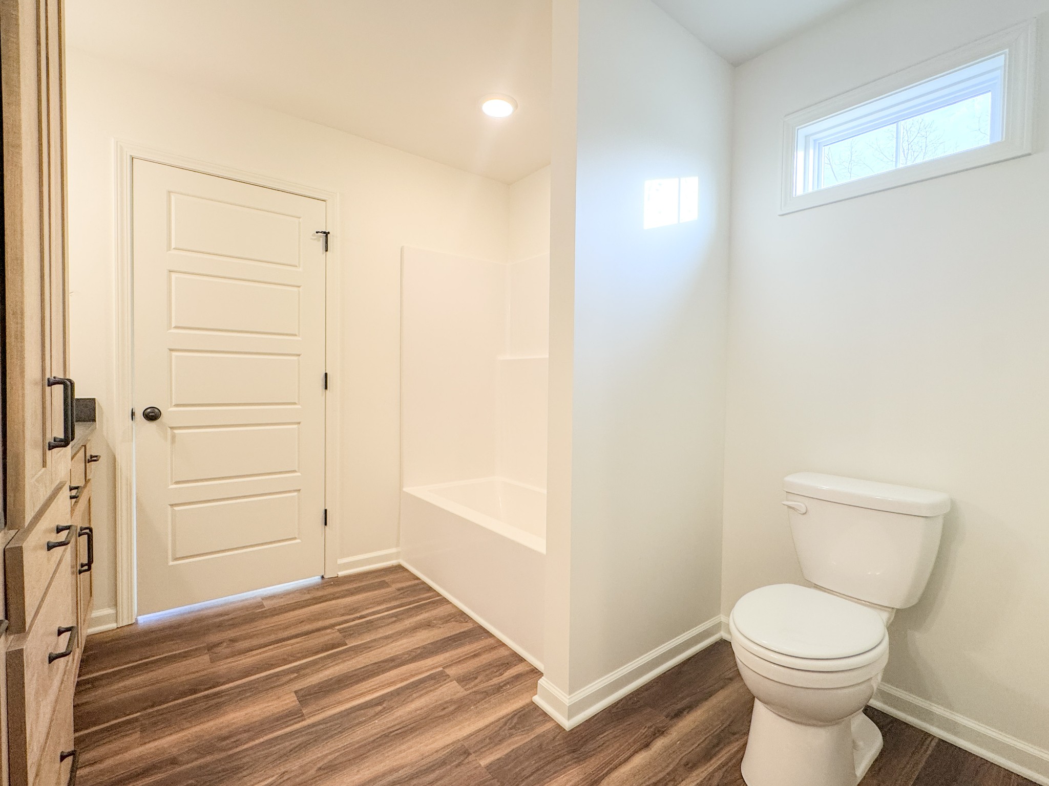 517 Pleasant Hill Road Lafayette, TN 37083 - Photo 19 of 39 a bathroom with a toilet and a shower