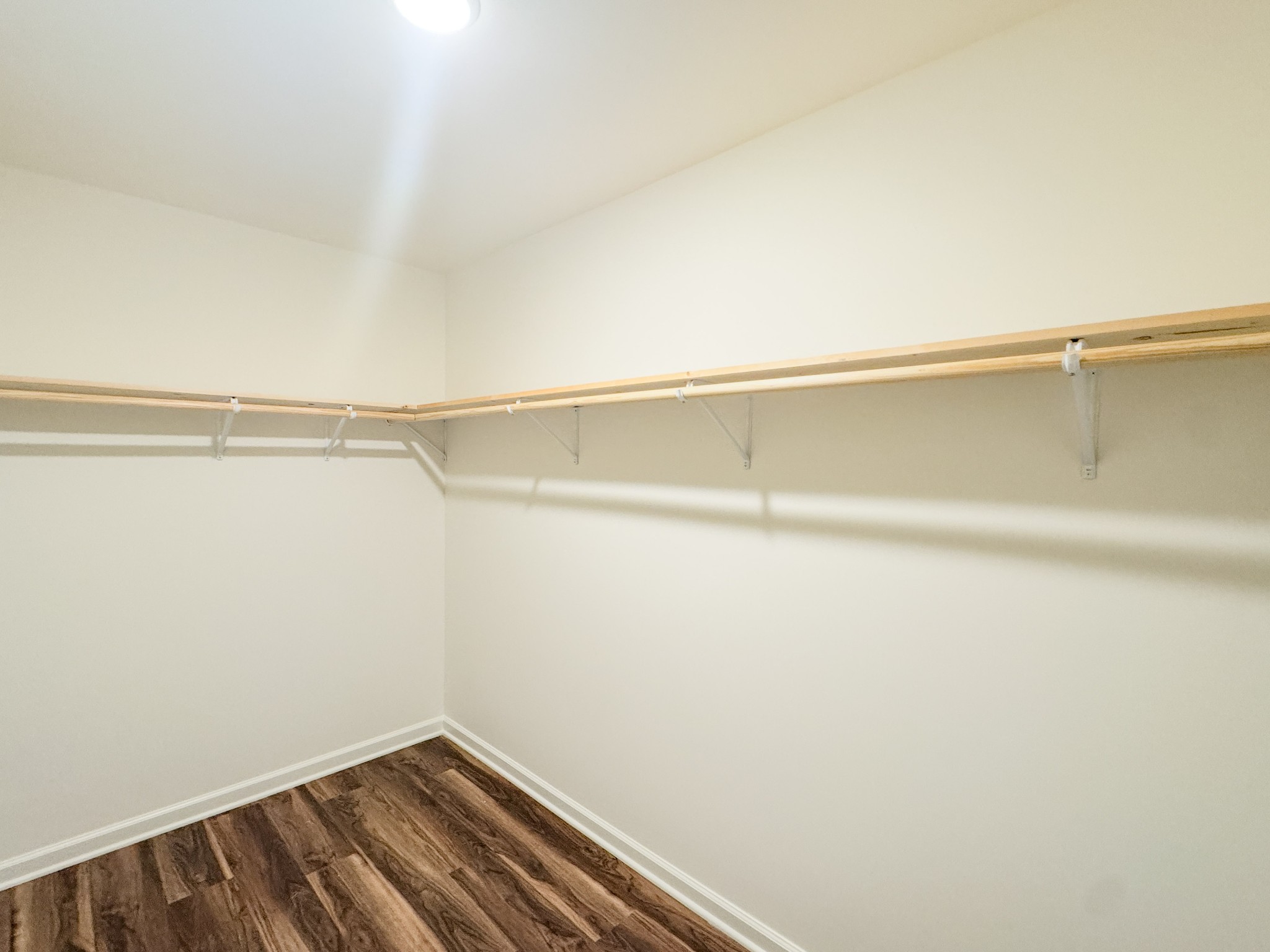 517 Pleasant Hill Road Lafayette, TN 37083 - Photo 20 of 39 a view of a room with racks on the wall