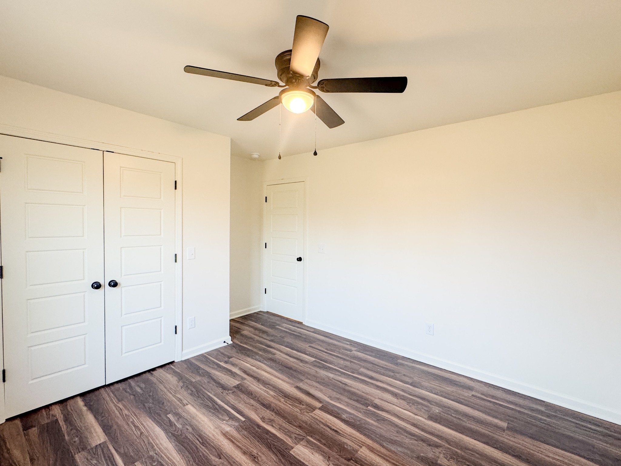 517 Pleasant Hill Road Lafayette, TN 37083 - Photo 22 of 39 a view of empty room with wooden floor