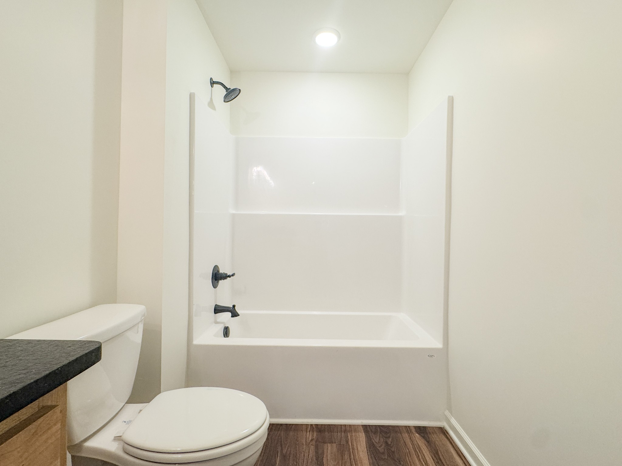 517 Pleasant Hill Road Lafayette, TN 37083 - Photo 24 of 39 a bathroom with a toilet and a bathtub