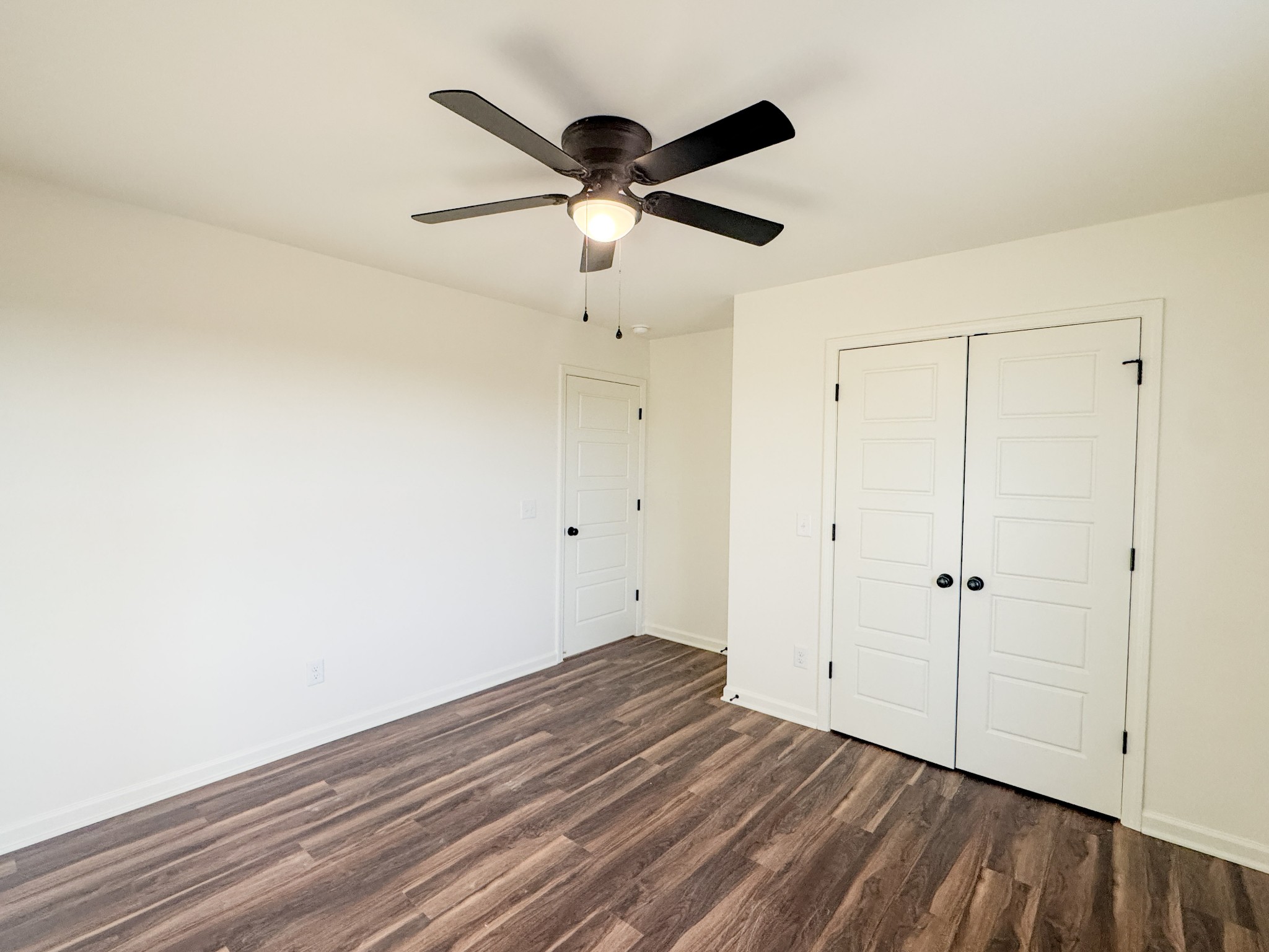 517 Pleasant Hill Road Lafayette, TN 37083 - Photo 26 of 39 wooden floor in an empty room