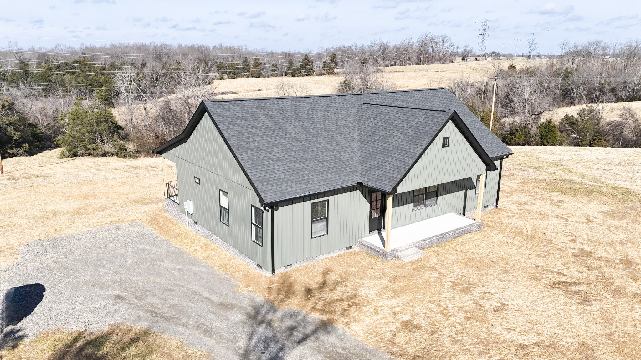 517 Pleasant Hill Road Lafayette, TN 37083 - Photo 29 of 39 a view of a house with wooden fence