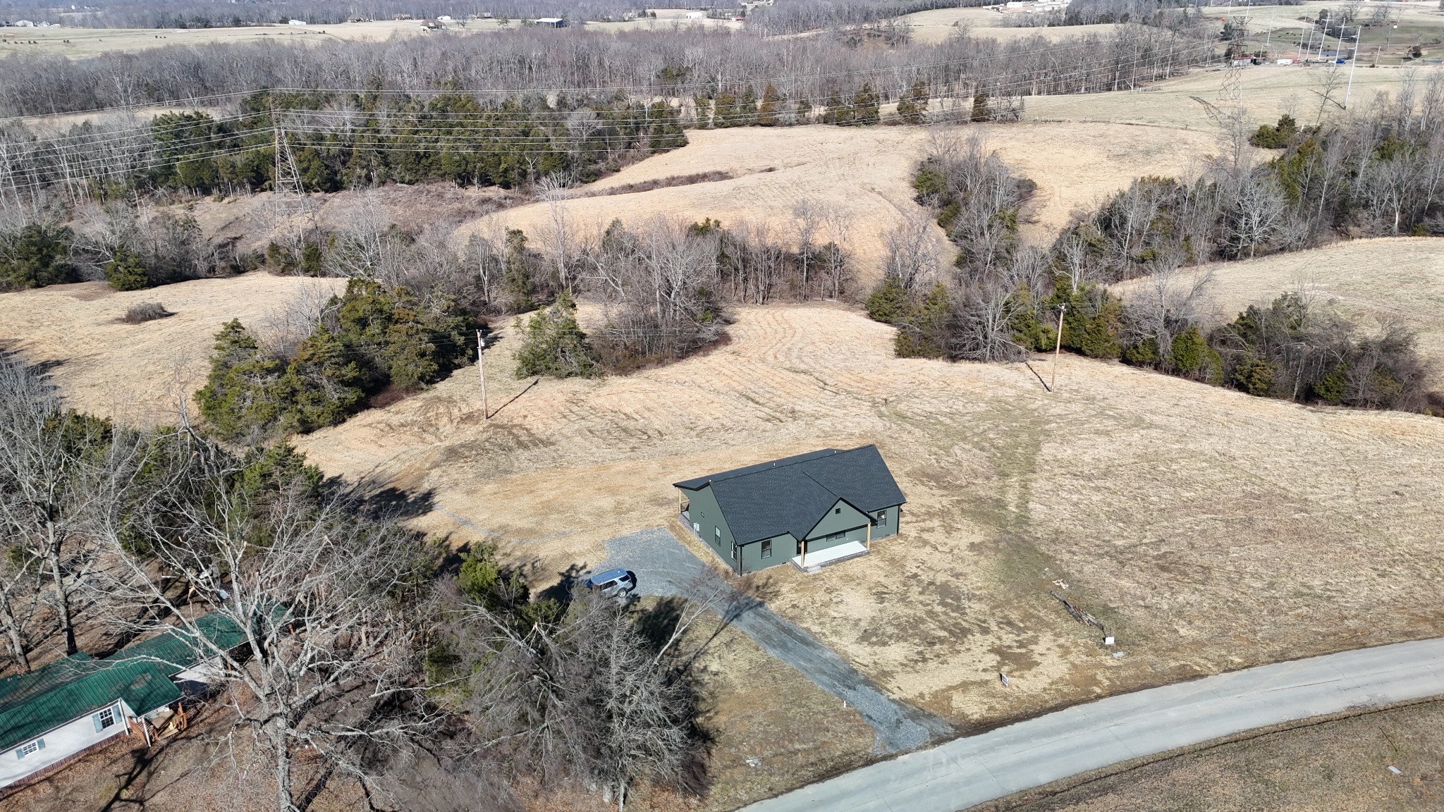 517 Pleasant Hill Road Lafayette, TN 37083 - Photo 33 of 39 a view of a backyard of a house
