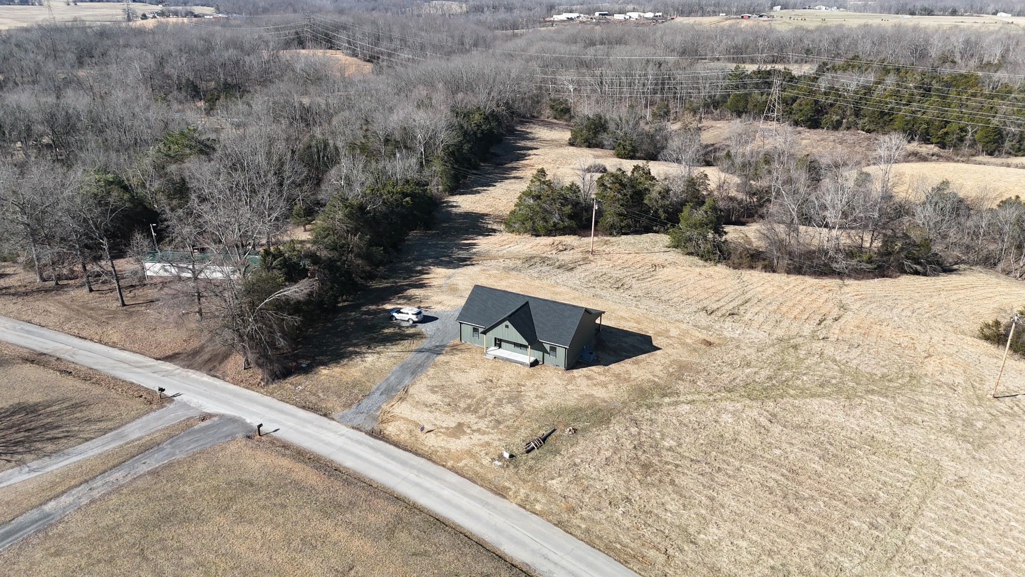 517 Pleasant Hill Road Lafayette, TN 37083 - Photo 34 of 39 a view of a backyard of a house