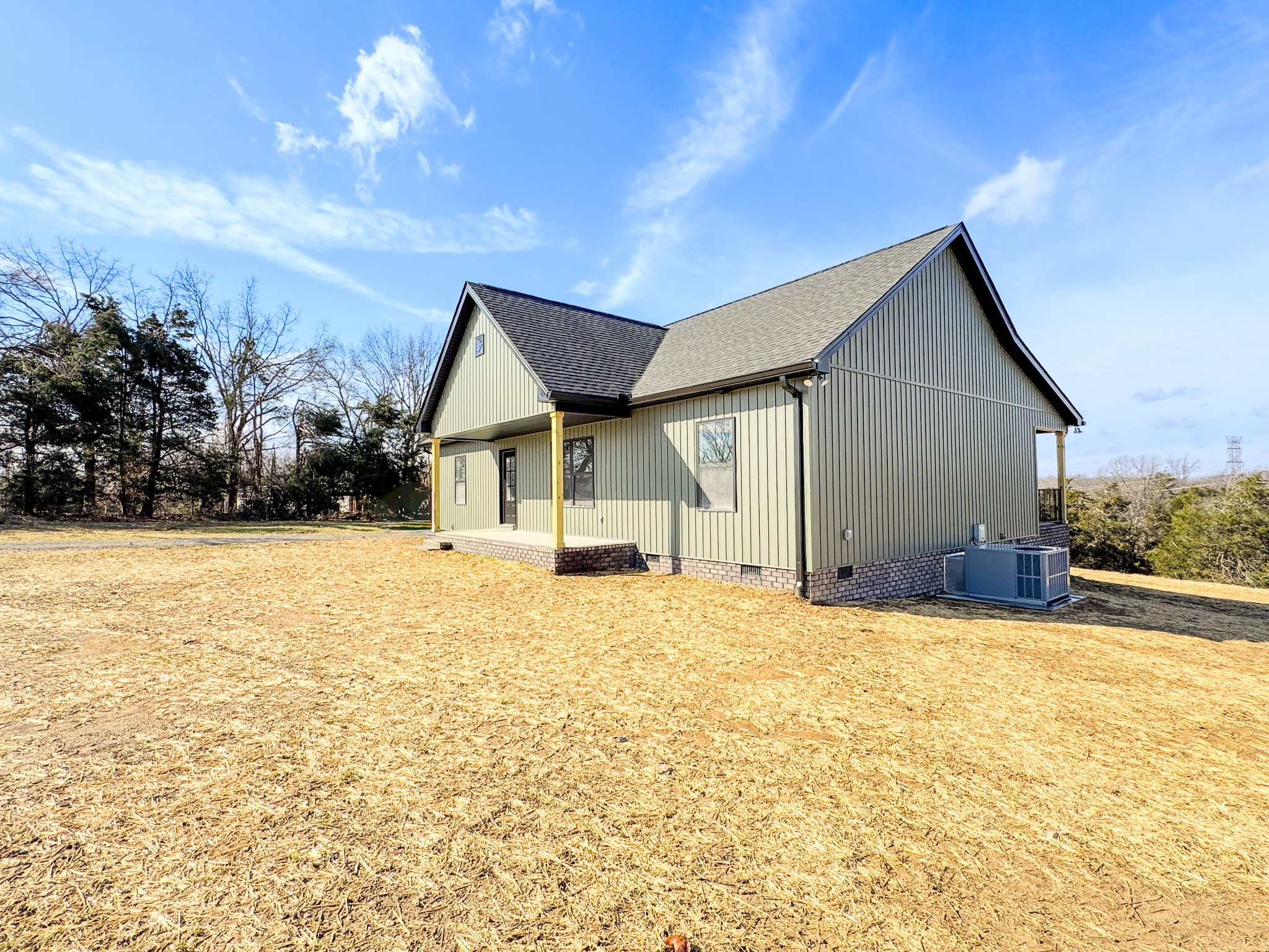 517 Pleasant Hill Road Lafayette, TN 37083 - Photo 4 of 39 a view of a house with snow on the ground