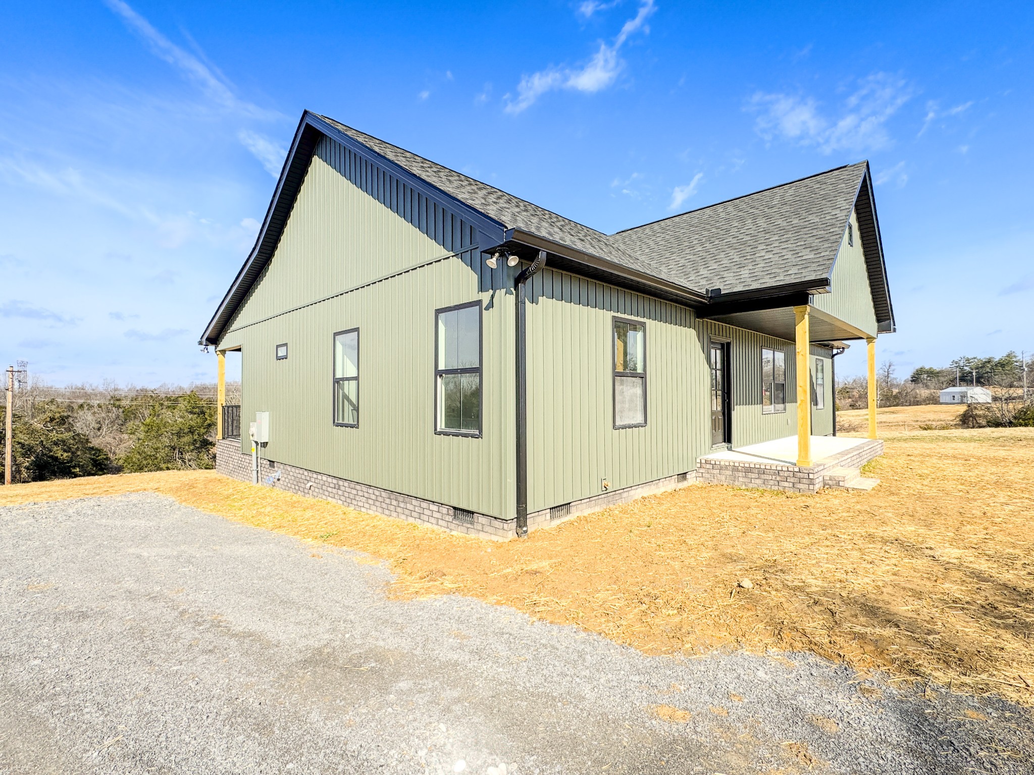 517 Pleasant Hill Road Lafayette, TN 37083 - Photo 5 of 39 a view of a house with a yard