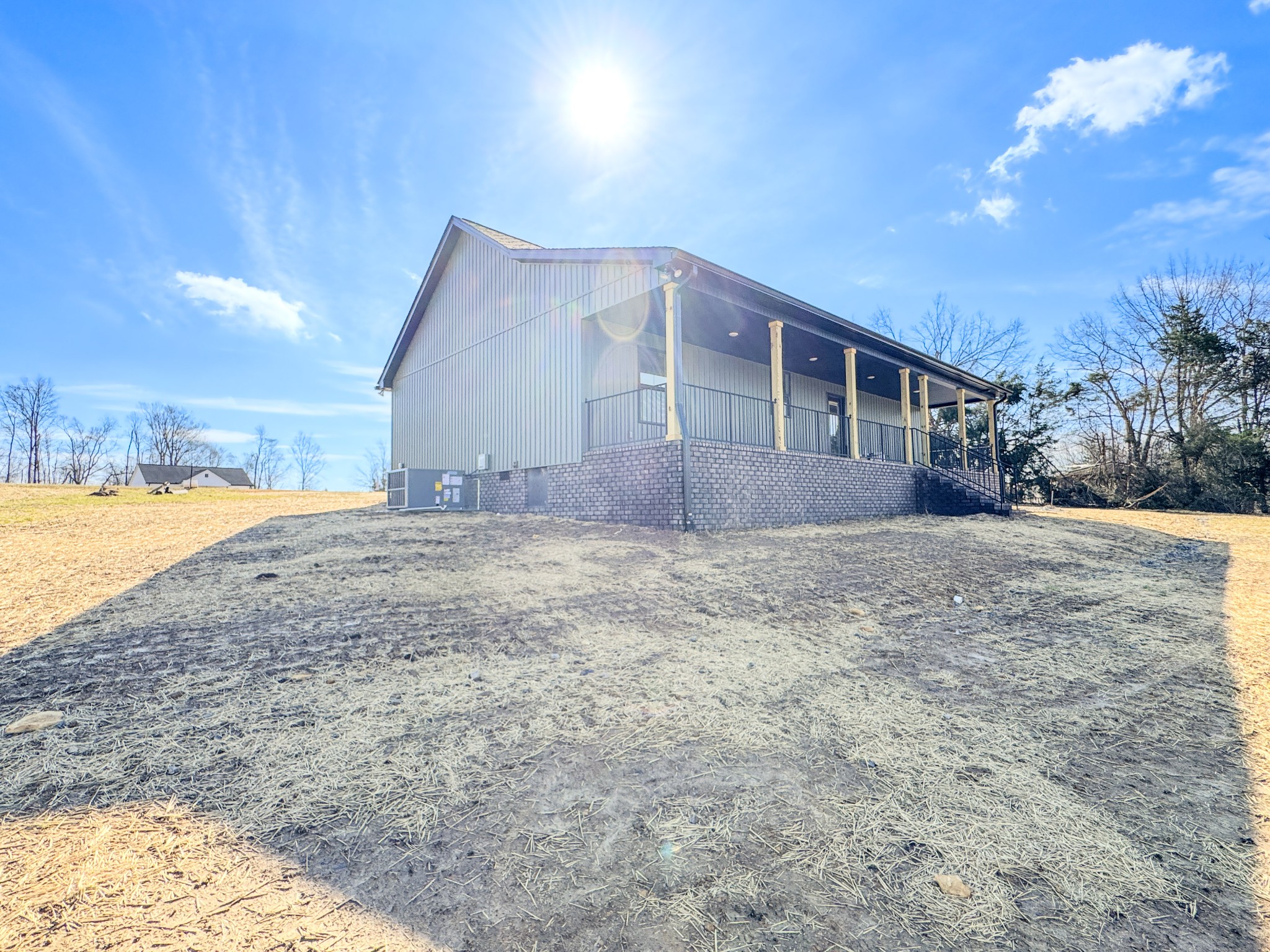 517 Pleasant Hill Road Lafayette, TN 37083 - Photo 7 of 39 a house view with a backyard space