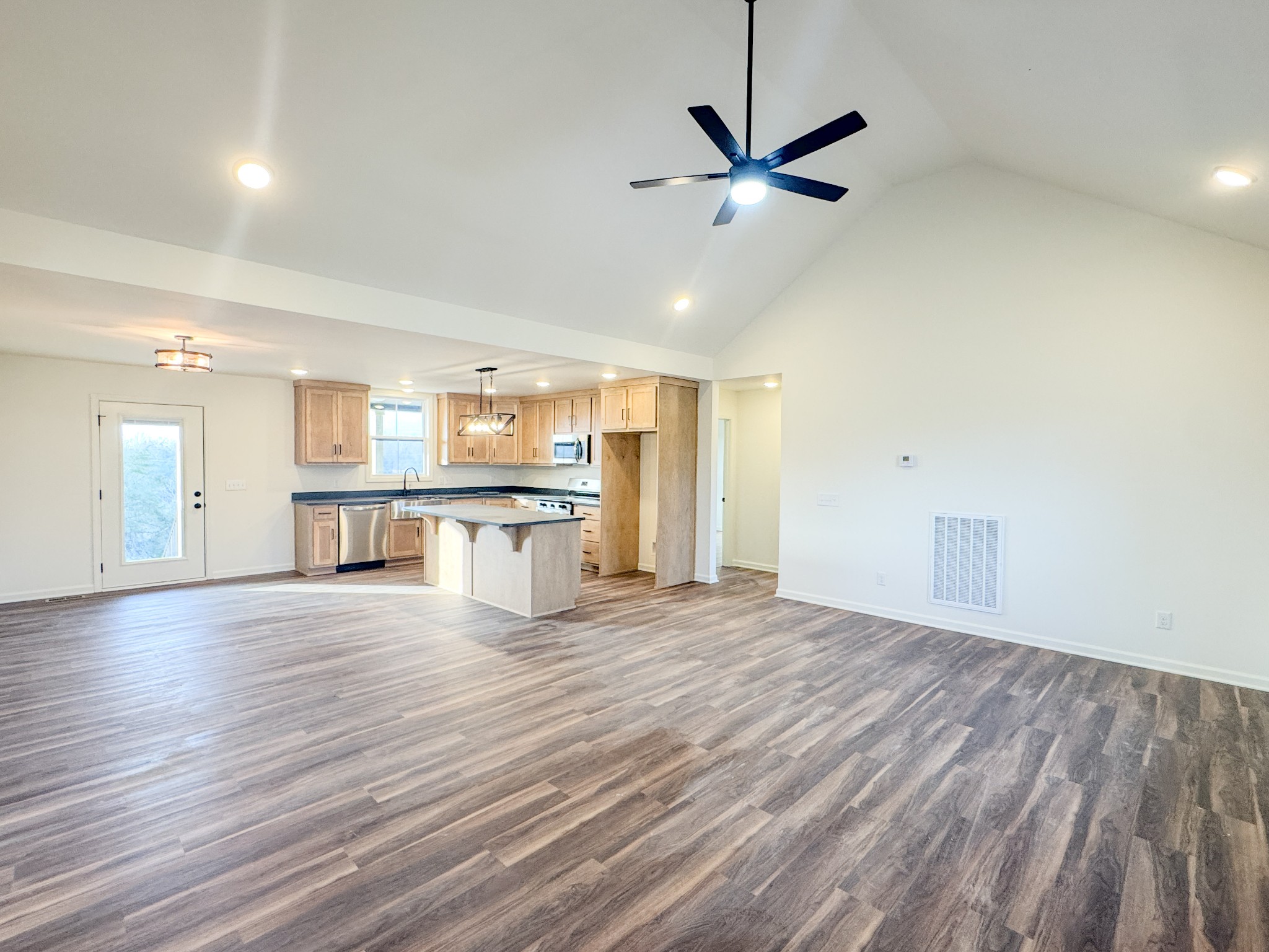 517 Pleasant Hill Road Lafayette, TN 37083 - Photo 8 of 39 a view of a kitchen with a sink and a kitchen counter top space