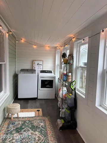a storage room with furniture and a window