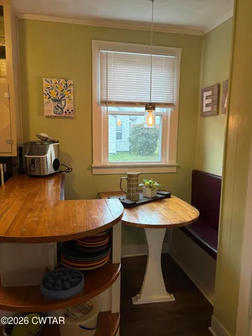 a room with furniture and window