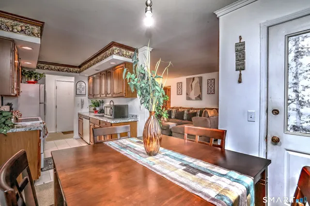 a living room with furniture and a table