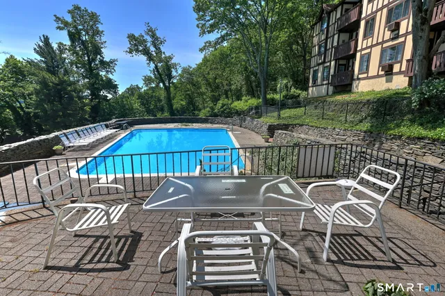 a view of a roof deck with couches