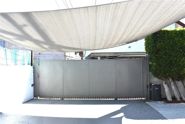 a view of a room with wooden walls