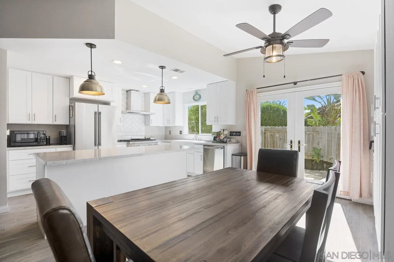 607 Maybritt Circle San Marcos, CA 92069 - Photo 14 of 38 a view of kitchen with cabinets and wooden floor