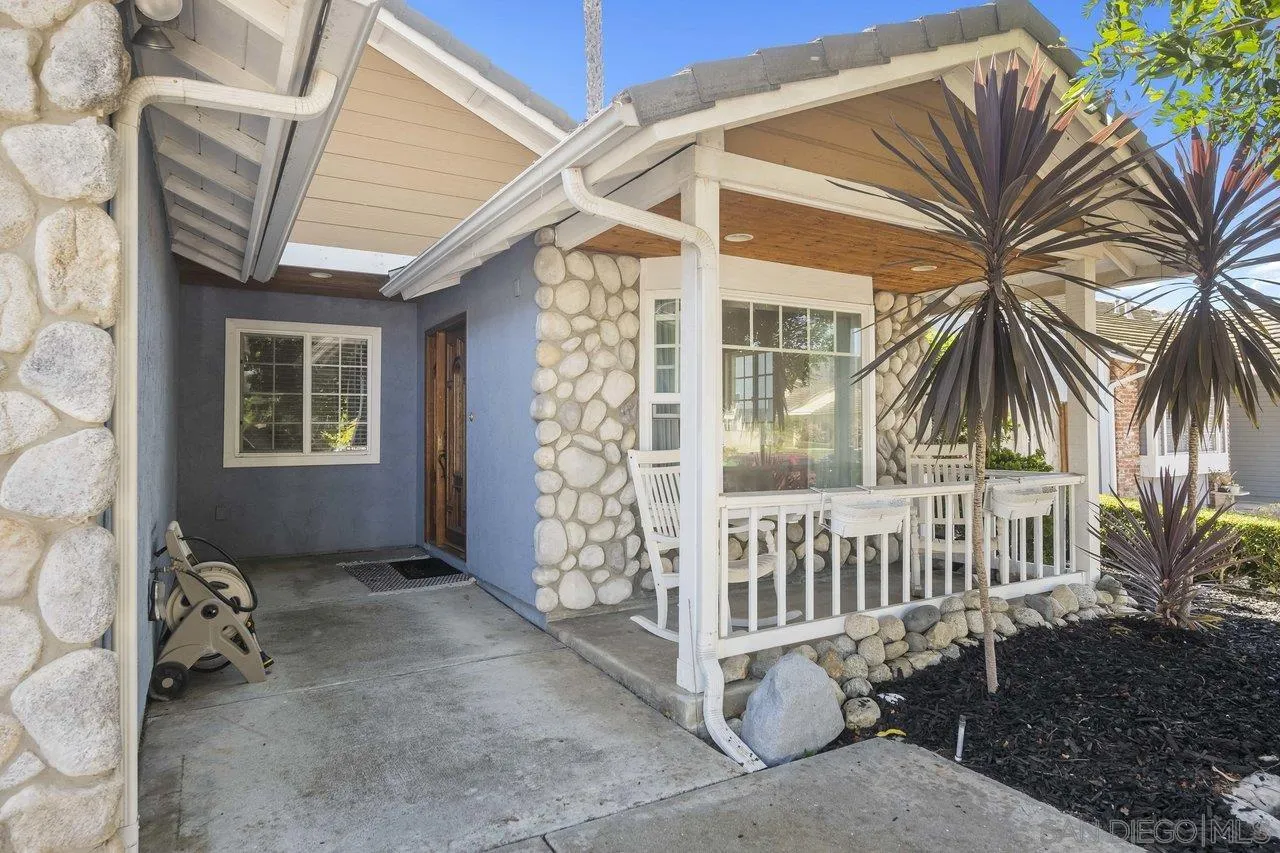 607 Maybritt Circle San Marcos, CA 92069 - Photo 3 of 38 a view of entryway with a yard