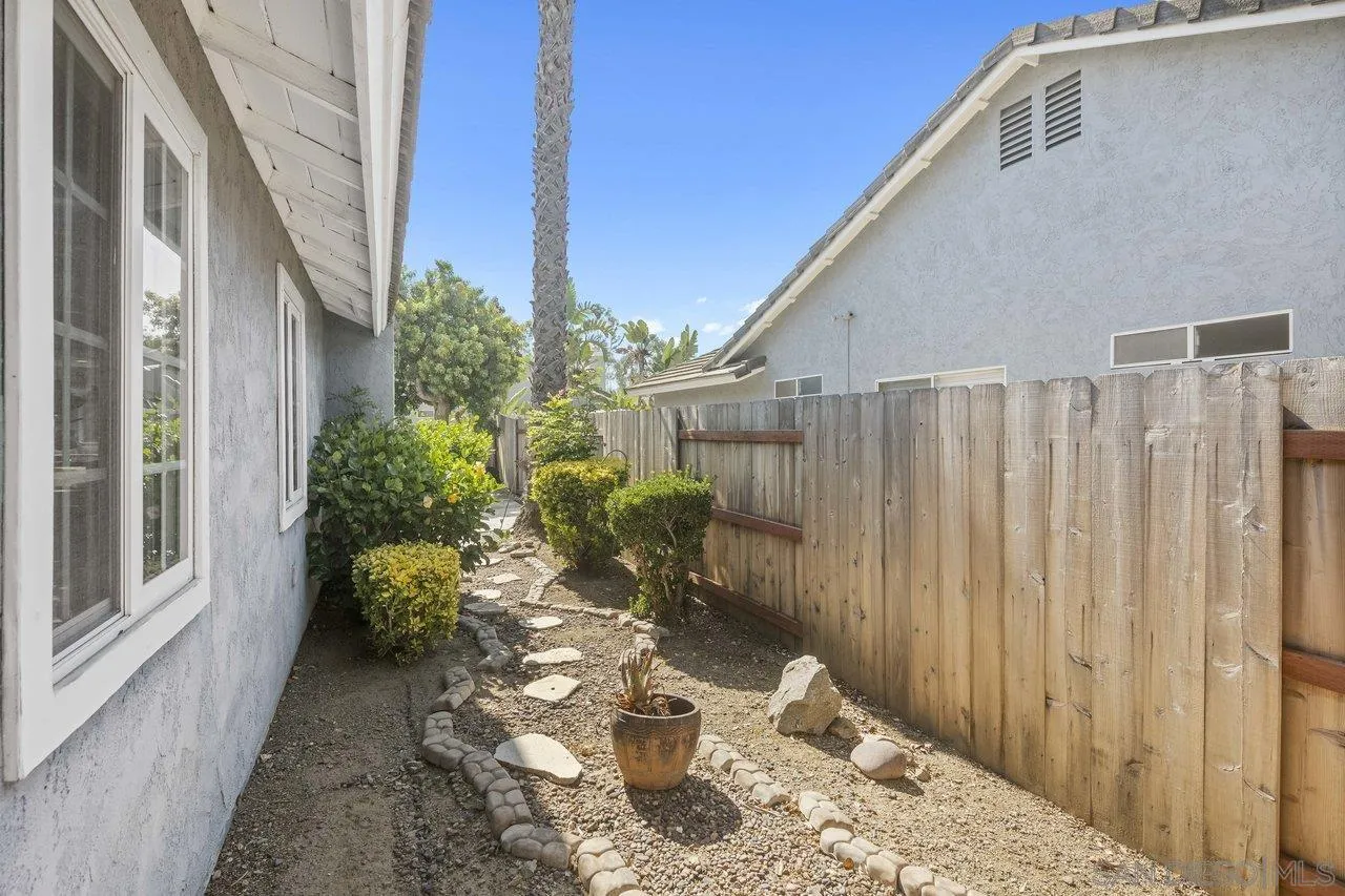 607 Maybritt Circle San Marcos, CA 92069 - Photo 37 of 38 a view of a backyard with chair and table