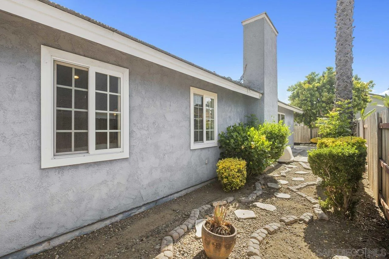 607 Maybritt Circle San Marcos, CA 92069 - Photo 38 of 38 a front view of a house with a yard
