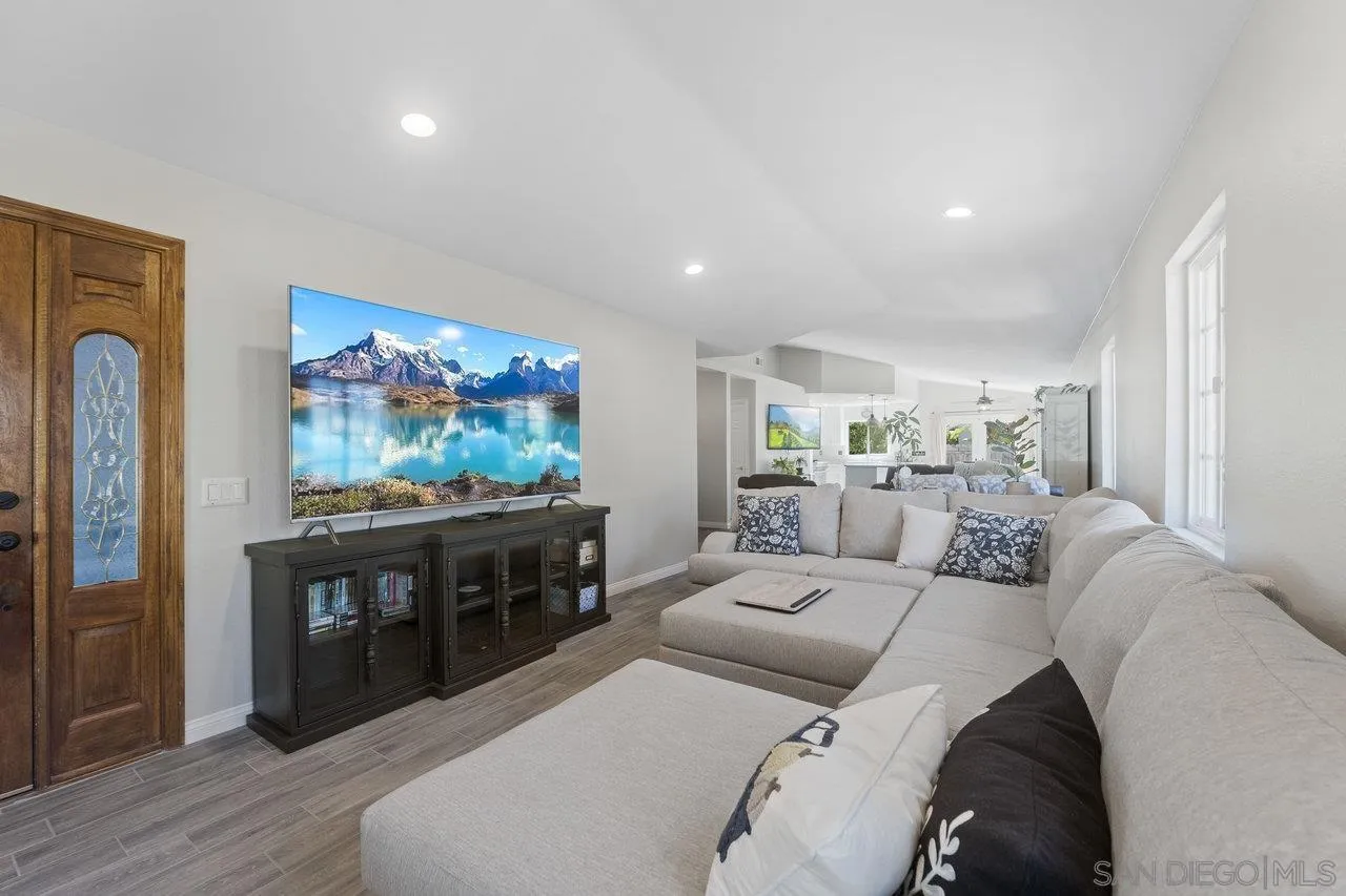 607 Maybritt Circle San Marcos, CA 92069 - Photo 6 of 38 a living room with furniture and a flat screen tv