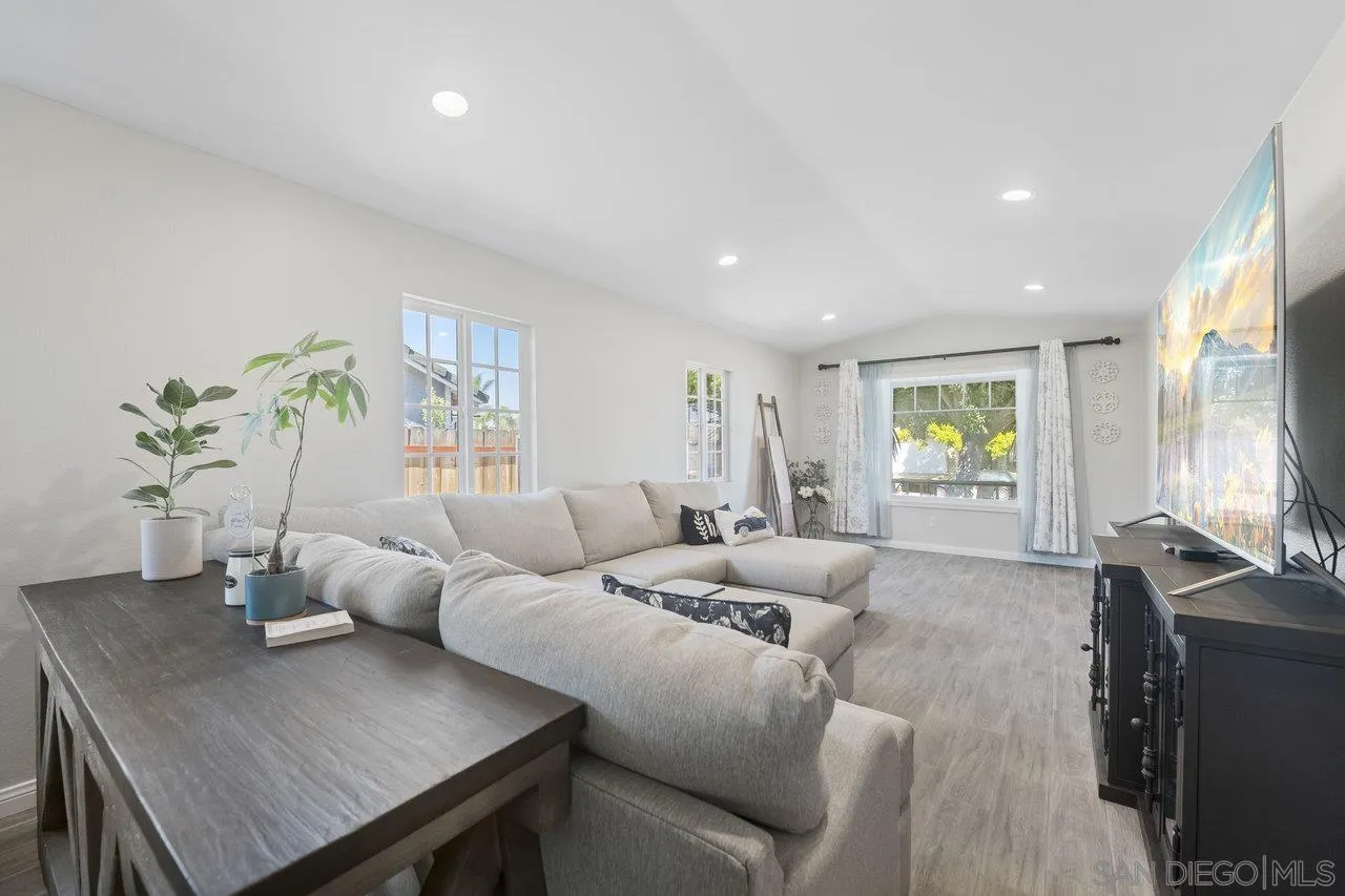 607 Maybritt Circle San Marcos, CA 92069 - Photo 8 of 38 a living room with furniture and a window
