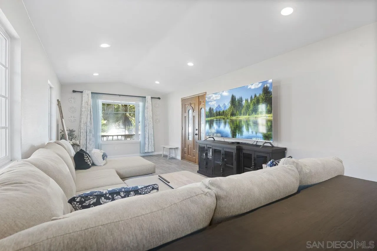 607 Maybritt Circle San Marcos, CA 92069 - Photo 9 of 38 a living room with furniture and a flat screen tv