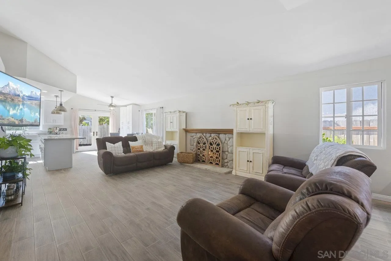 607 Maybritt Circle San Marcos, CA 92069 - Photo 10 of 38 a bedroom with furniture and a couch