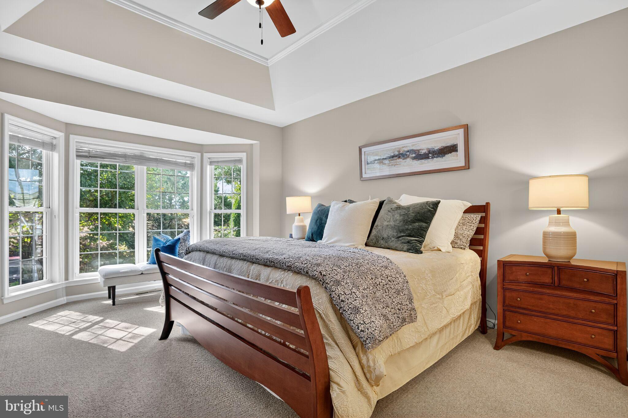 8157 American Holly Road Lorton, VA 22079 - Photo 12 of 48 a bedroom with a bed and a night stand