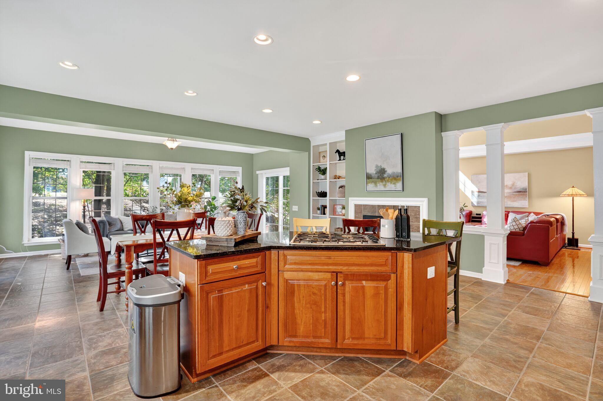 8157 American Holly Road Lorton, VA 22079 - Photo 21 of 48 a kitchen with lots of counter top space and furniture