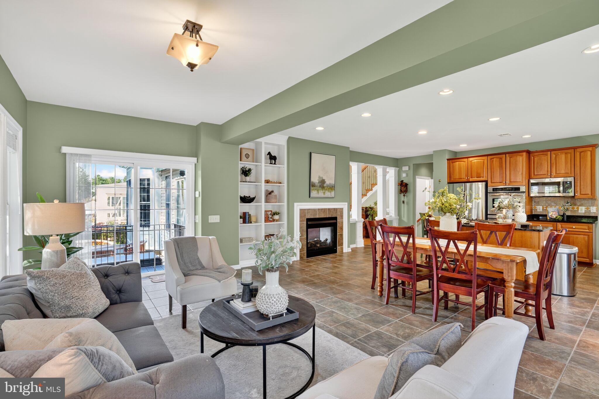8157 American Holly Road Lorton, VA 22079 - Photo 25 of 48 a living room with furniture kitchen view and a large window
