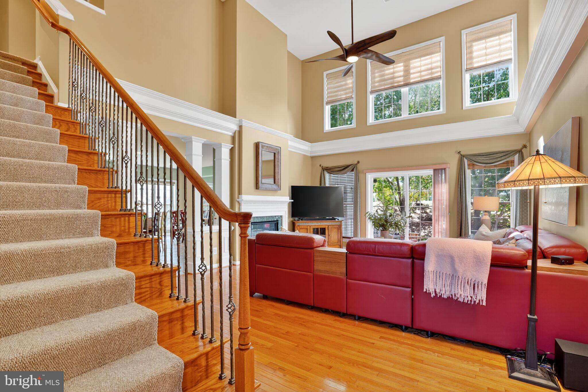 8157 American Holly Road Lorton, VA 22079 - Photo 26 of 48 a view of entryway livingroom and hall with wooden floor