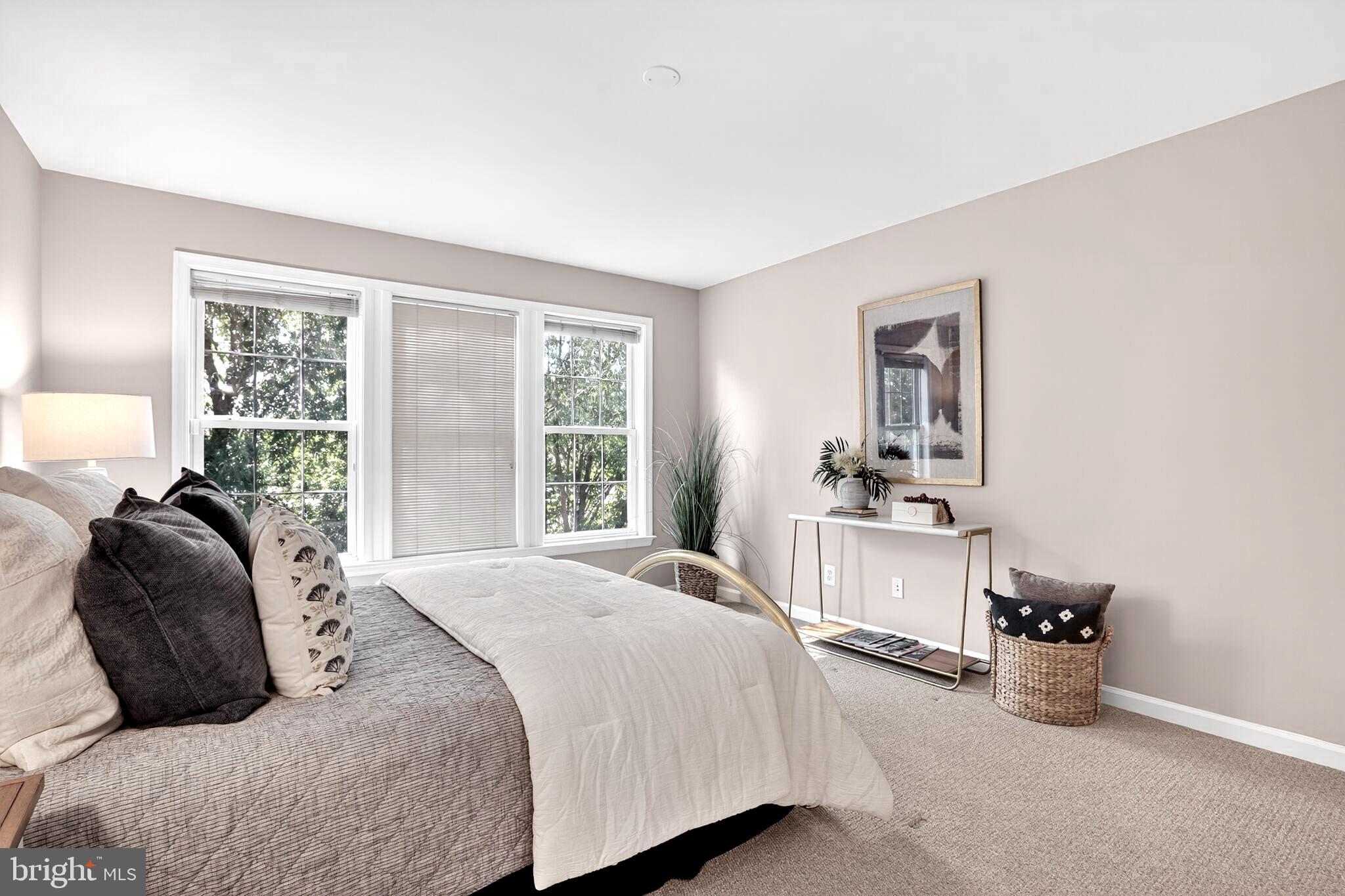 8157 American Holly Road Lorton, VA 22079 - Photo 28 of 48 a bedroom with a bed and a window