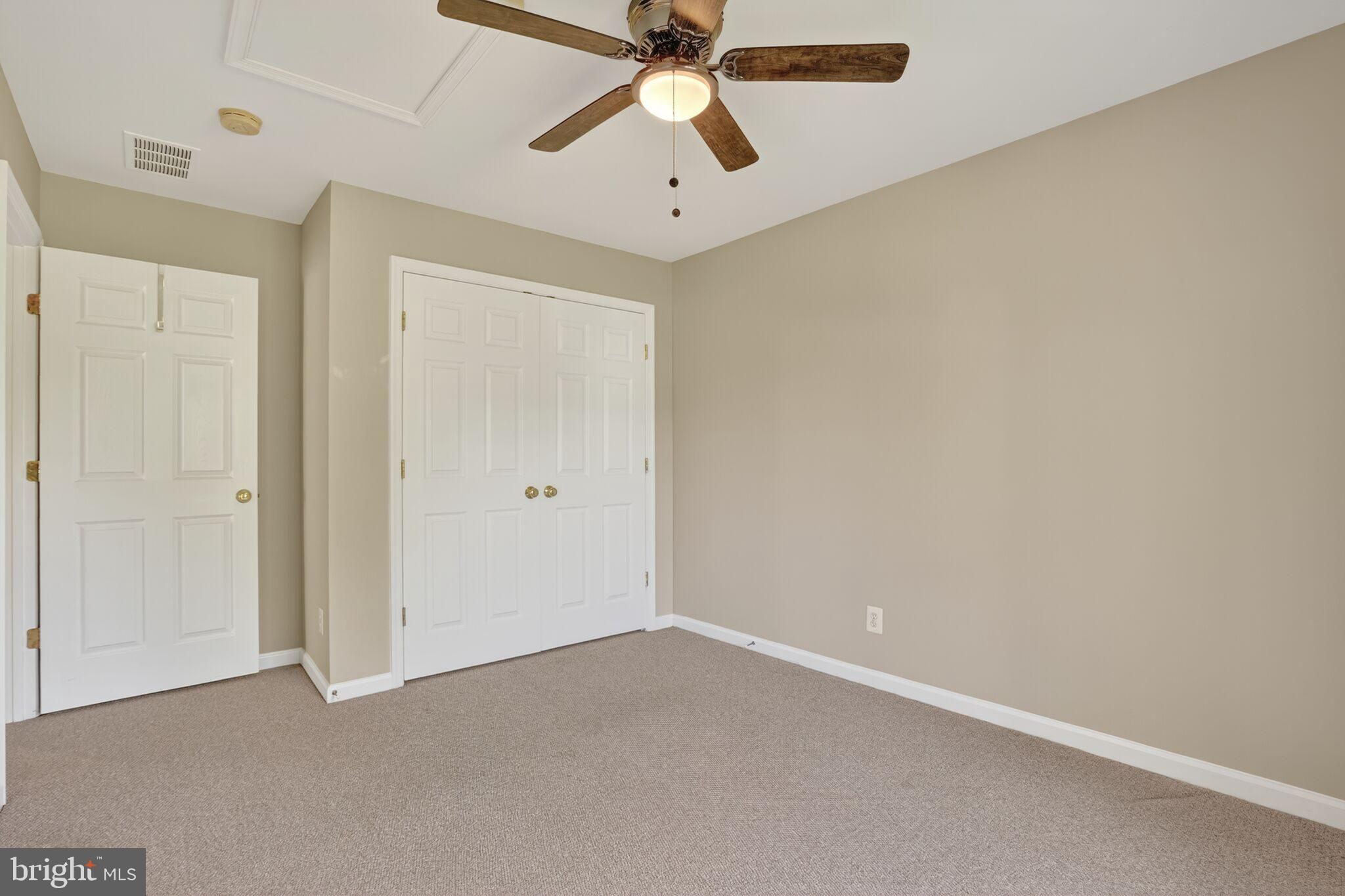 8157 American Holly Road Lorton, VA 22079 - Photo 37 of 48 a view of an empty room