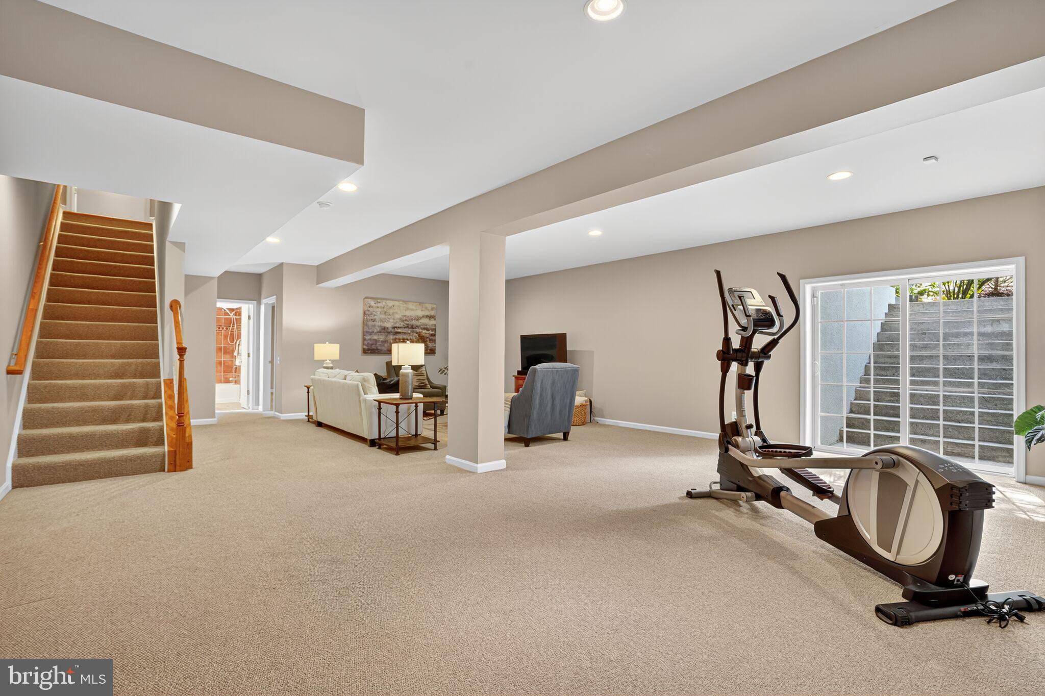 8157 American Holly Road Lorton, VA 22079 - Photo 38 of 48 a view of a room with gym equipment