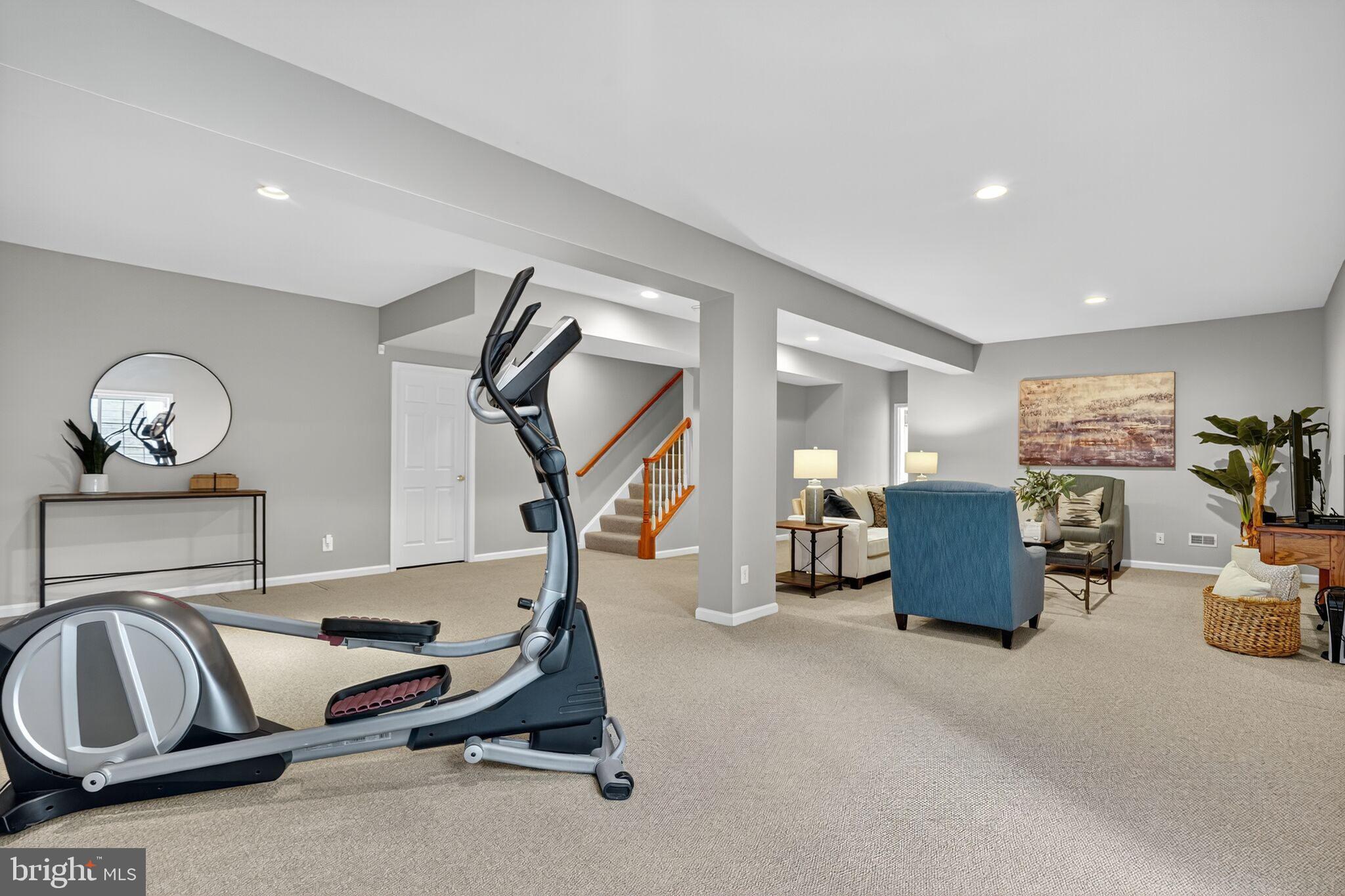 8157 American Holly Road Lorton, VA 22079 - Photo 39 of 48 a room with gym equipment