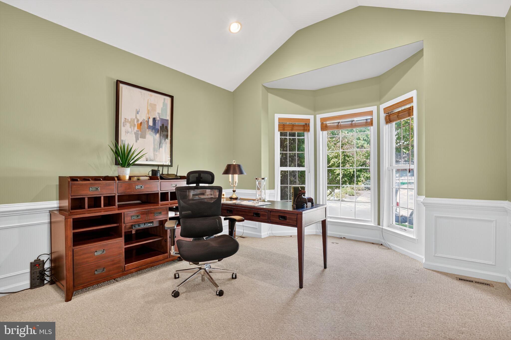 8157 American Holly Road Lorton, VA 22079 - Photo 7 of 48 a view of a workspace with furniture and a window