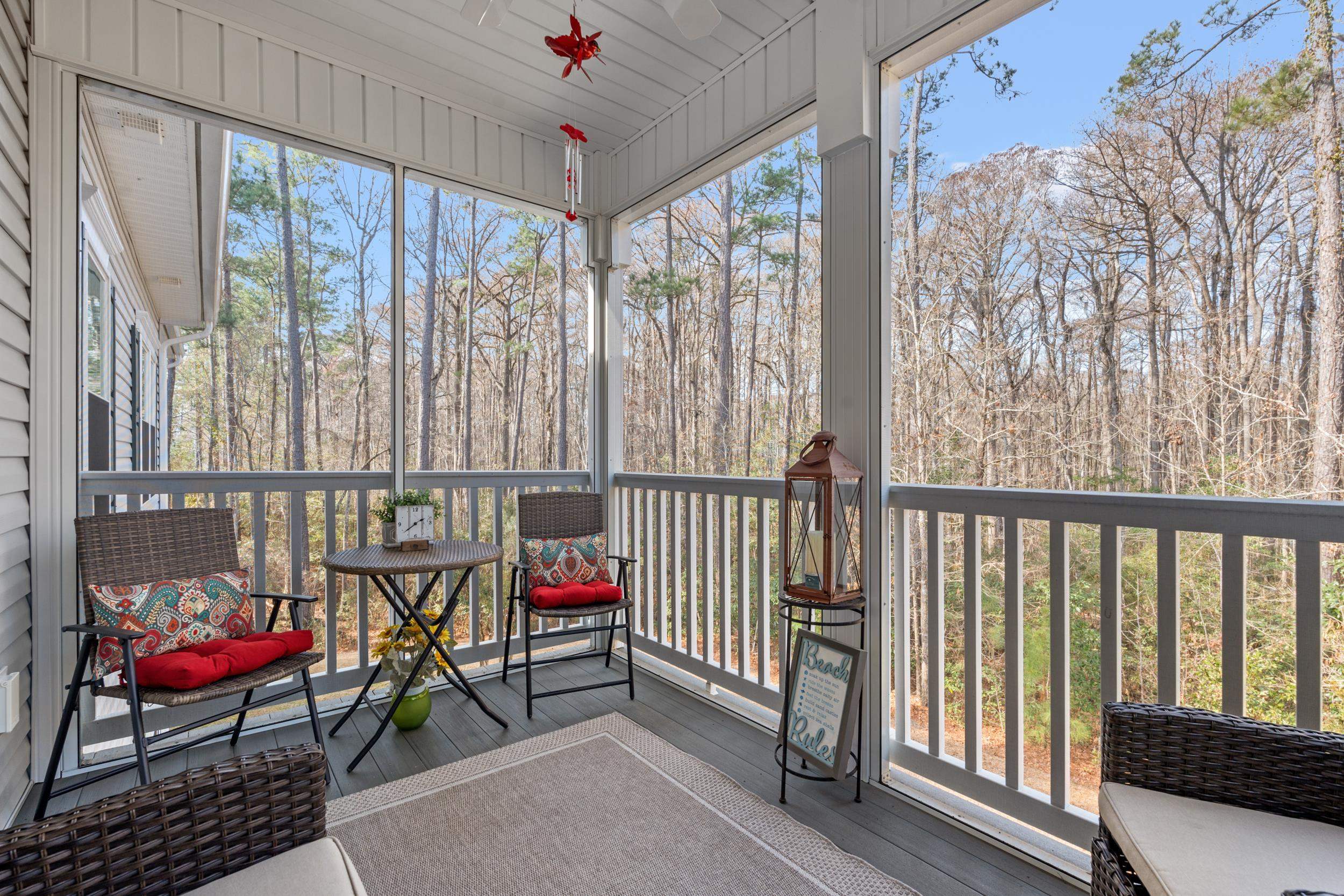 900 Jackline Place, Unit 202 Murrells Inlet, SC 29576 - Photo 8 of 39 Screened Porch with a ceiling fan