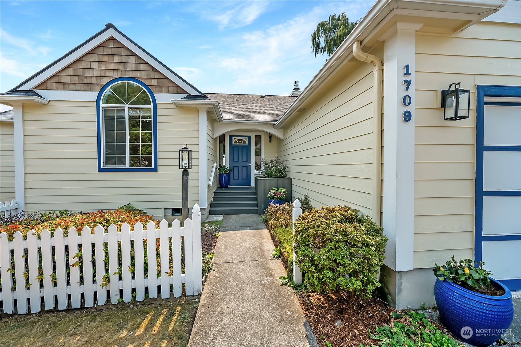 1709 24th Court Anacortes, WA 98221 - Photo 2 of 33 a front view of a house having yard