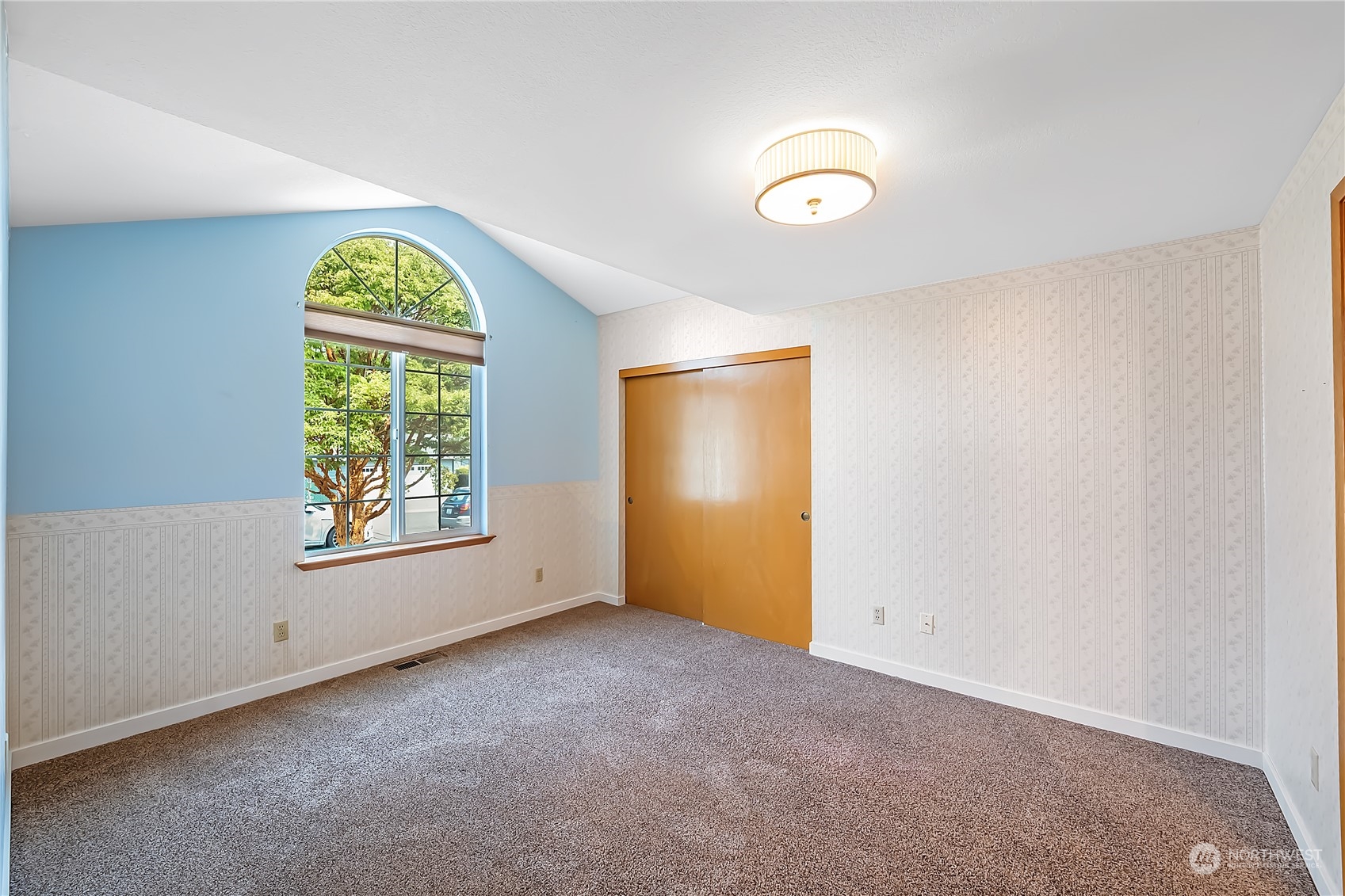 1709 24th Court Anacortes, WA 98221 - Photo 23 of 33 an empty room with windows