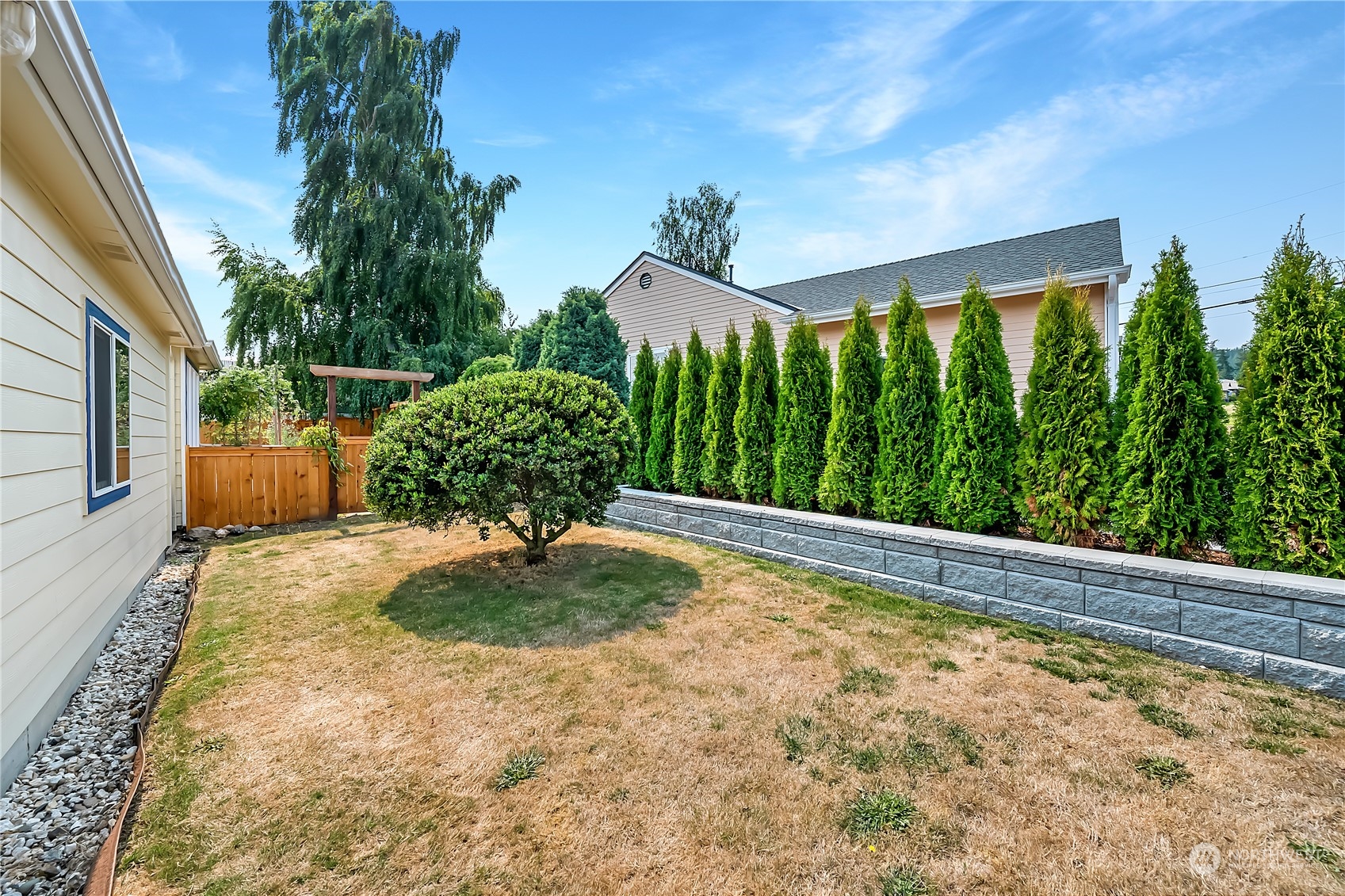 1709 24th Court Anacortes, WA 98221 - Photo 27 of 33 a view of a backyard of a house