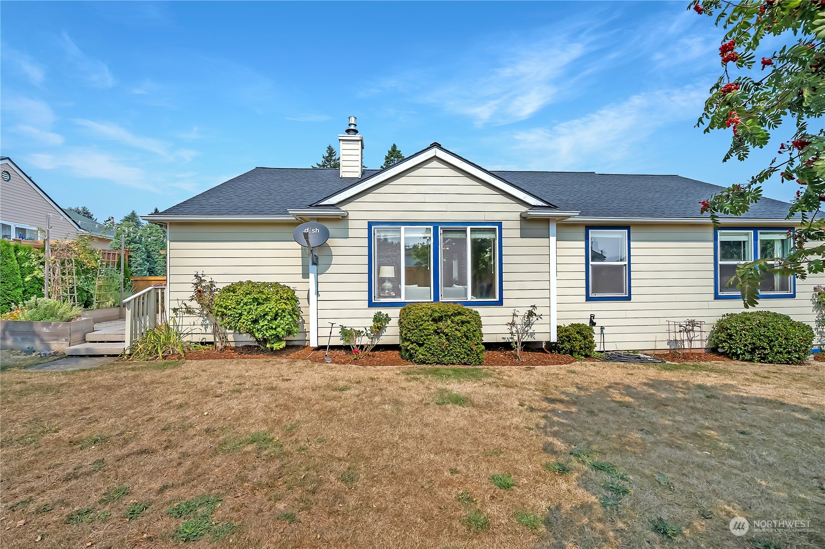 1709 24th Court Anacortes, WA 98221 - Photo 28 of 33 a front view of a house with garden