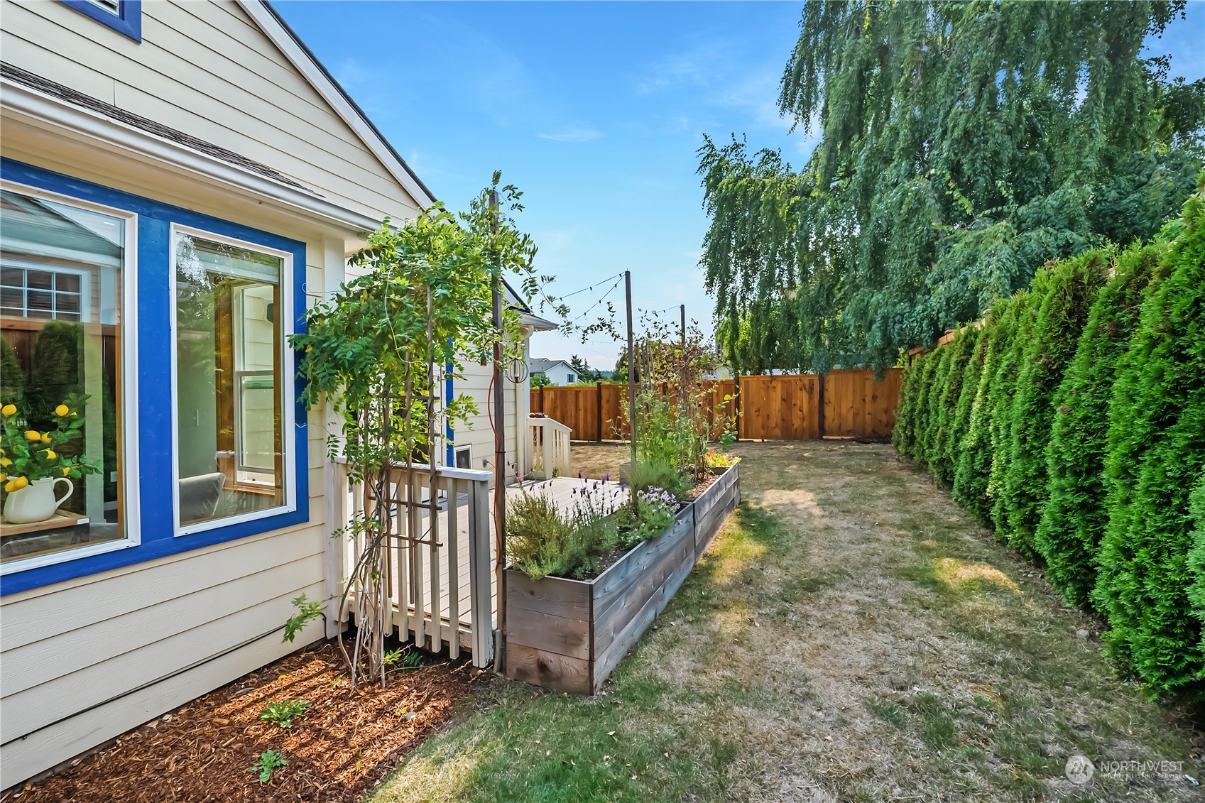 1709 24th Court Anacortes, WA 98221 - Photo 30 of 33 a view of a back yard from a balcony