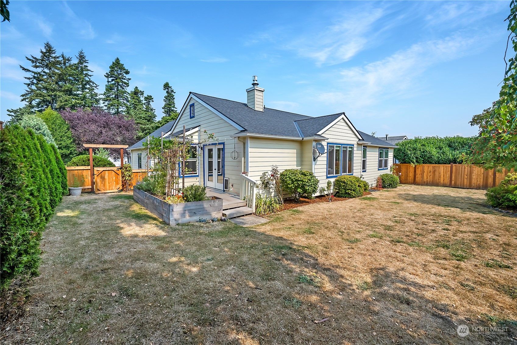 1709 24th Court Anacortes, WA 98221 - Photo 3 of 33 a view of a house with backyard and porch