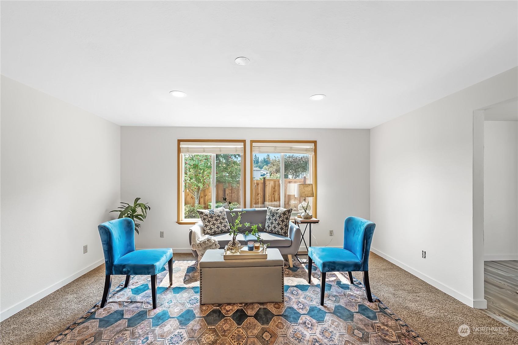 1709 24th Court Anacortes, WA 98221 - Photo 7 of 33 a living room with furniture and a potted plant