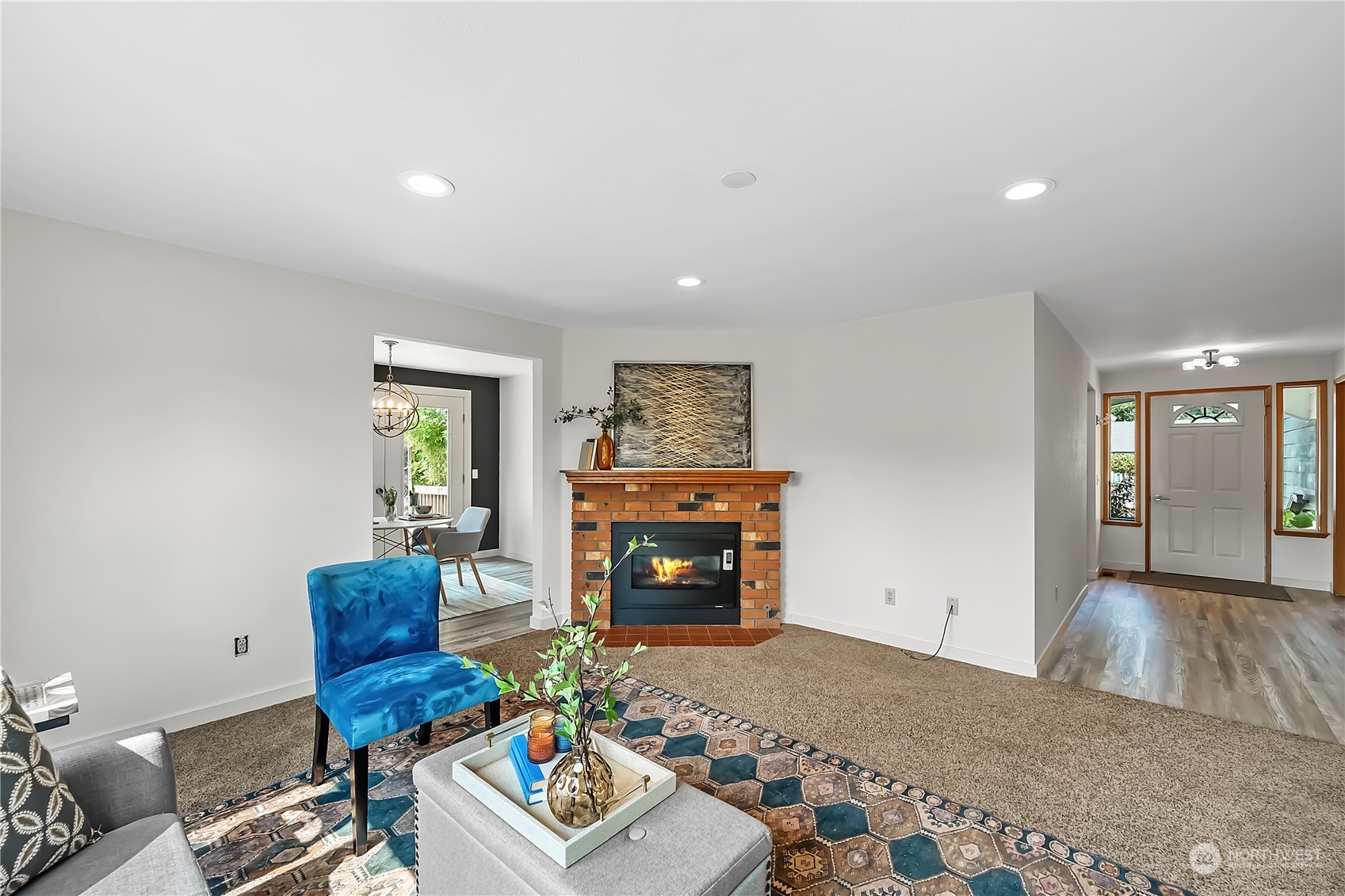 1709 24th Court Anacortes, WA 98221 - Photo 8 of 33 a living room with furniture and a fireplace