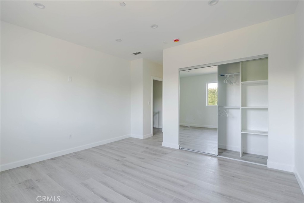 17428 Roscoe Boulevard Northridge, CA 91325 - Photo 15 of 24 wooden floor in an empty room