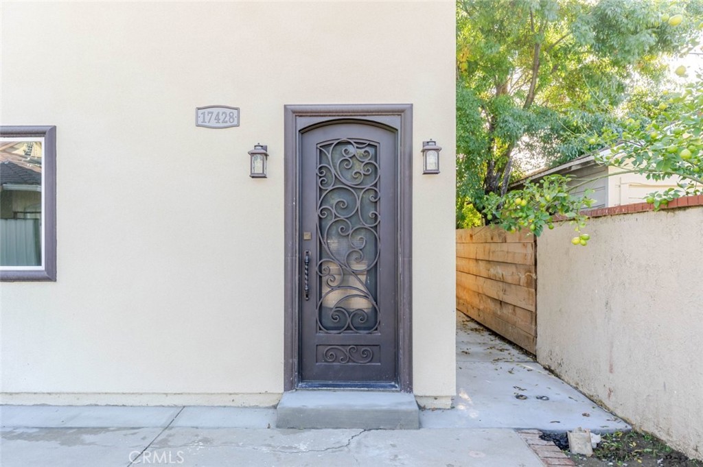 17428 Roscoe Boulevard Northridge, CA 91325 - Photo 3 of 24 a view of front door with wooden door