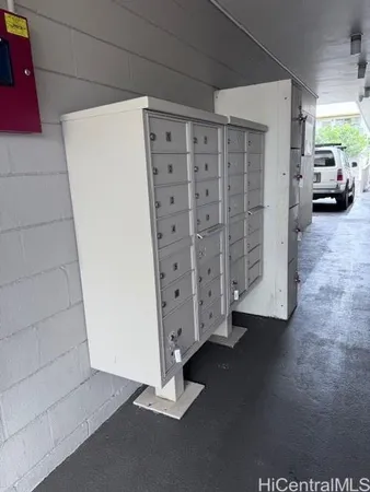 a view of empty room with white walls