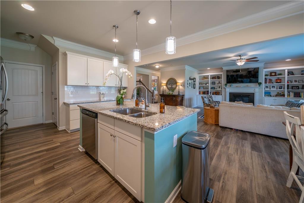 172 Mercer Lane Cartersville, GA 30120 - Photo 16 of 44 a kitchen with a sink appliances and cabinets