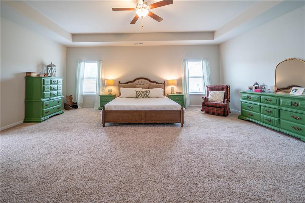 172 Mercer Lane Cartersville, GA 30120 - Photo 23 of 44 a bedroom with a bed and window